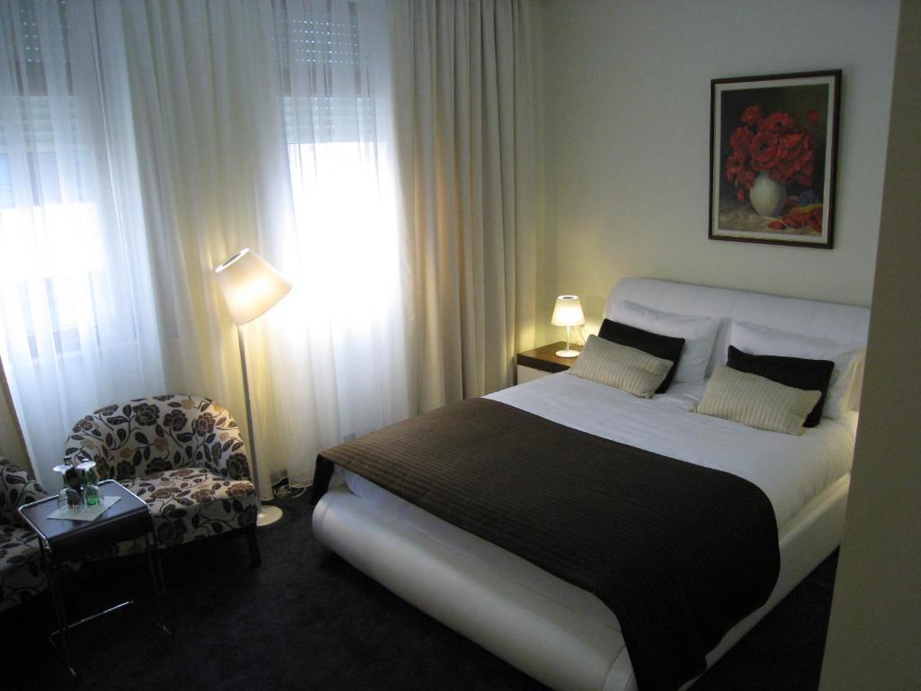 Boutique Hotel Kotoni Tirana Habitación foto